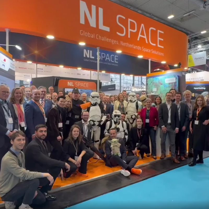 space business professionals at trade fair exhibition booth