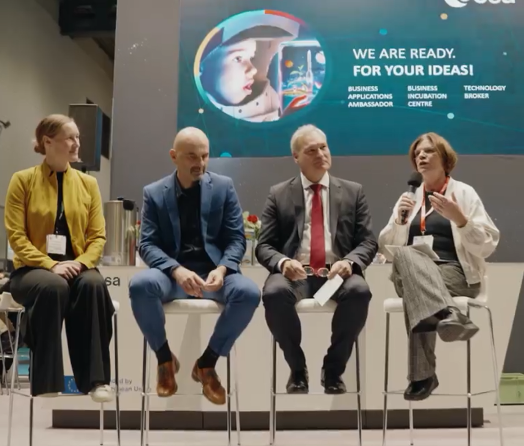 panel of space business professionals at trade fair