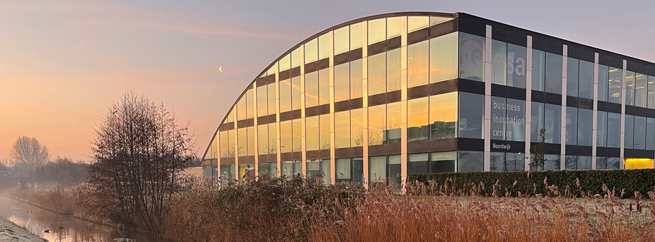 SBIC Noordwijk building at sunrise on a frosty morning with moon setting