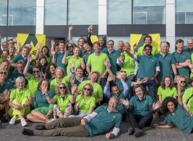 team shot of business professionals outside building