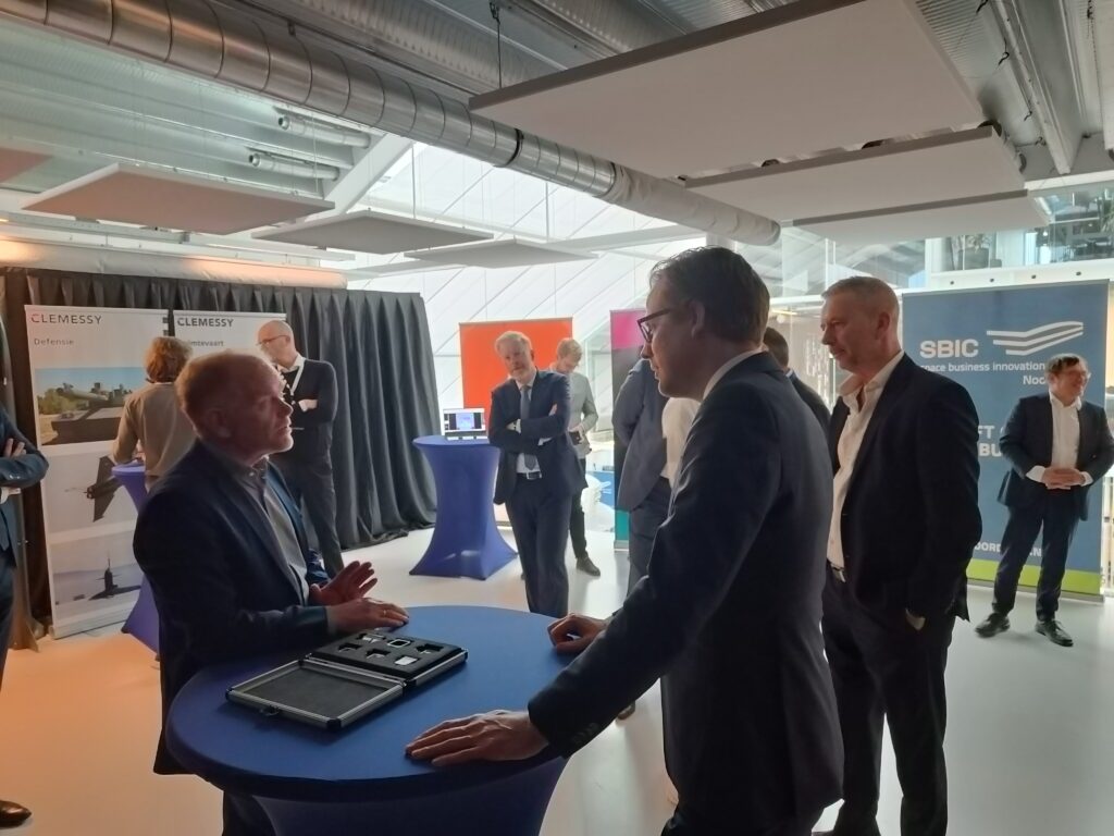 Dutch government defence minister speaking with space business entrepreneurs at SBIC Noordwijk